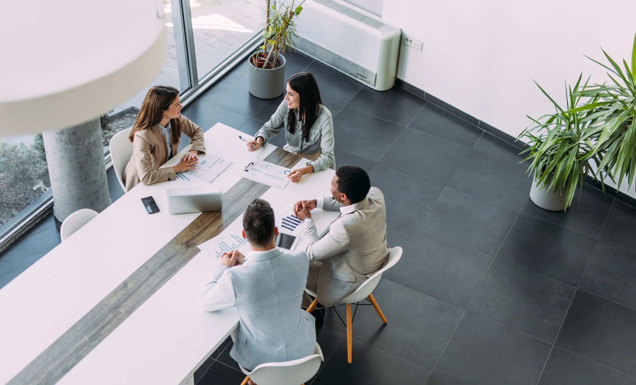 Recruitment professionals meeting around a conference table