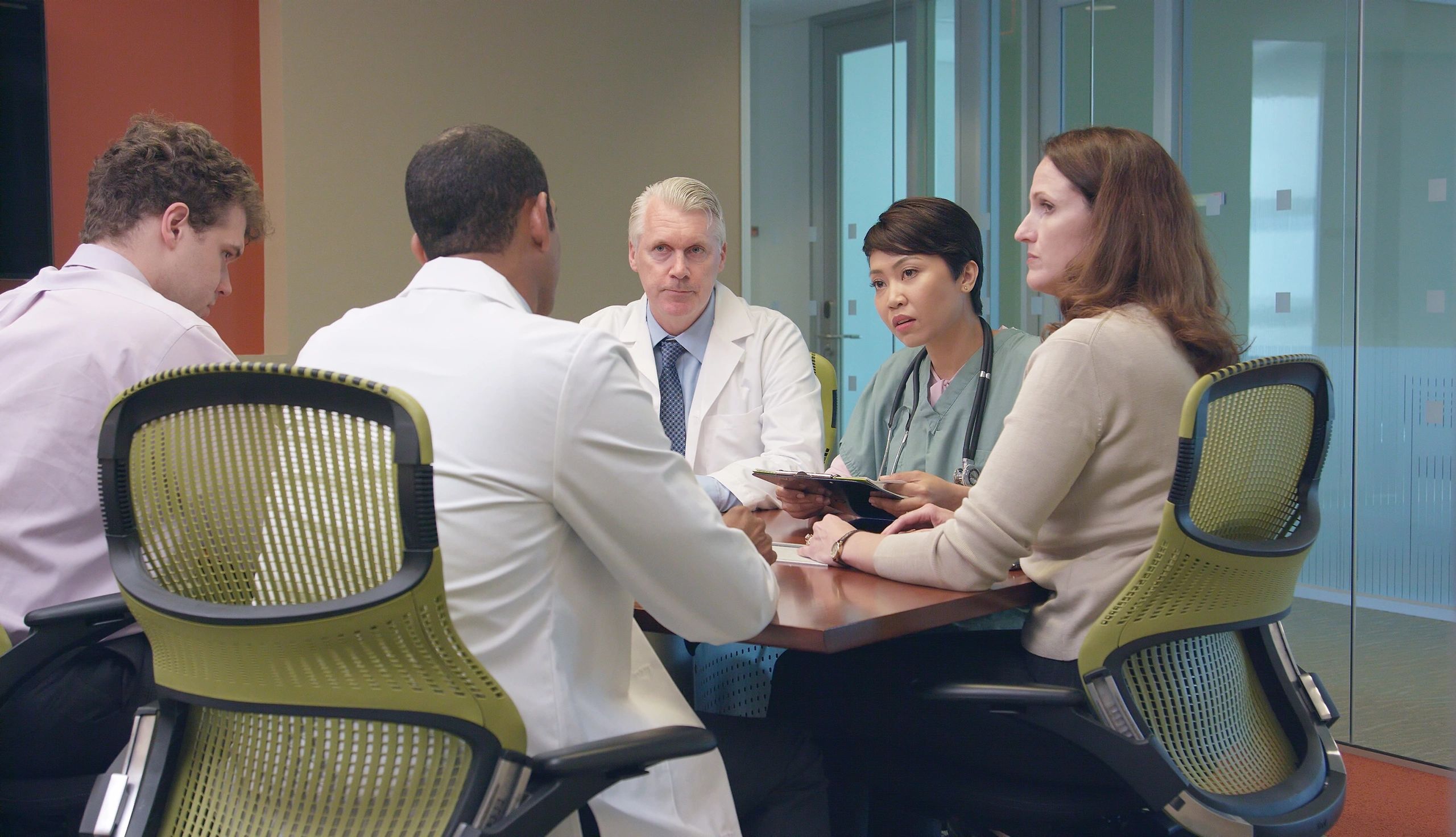 Medical professionals meeting in an office